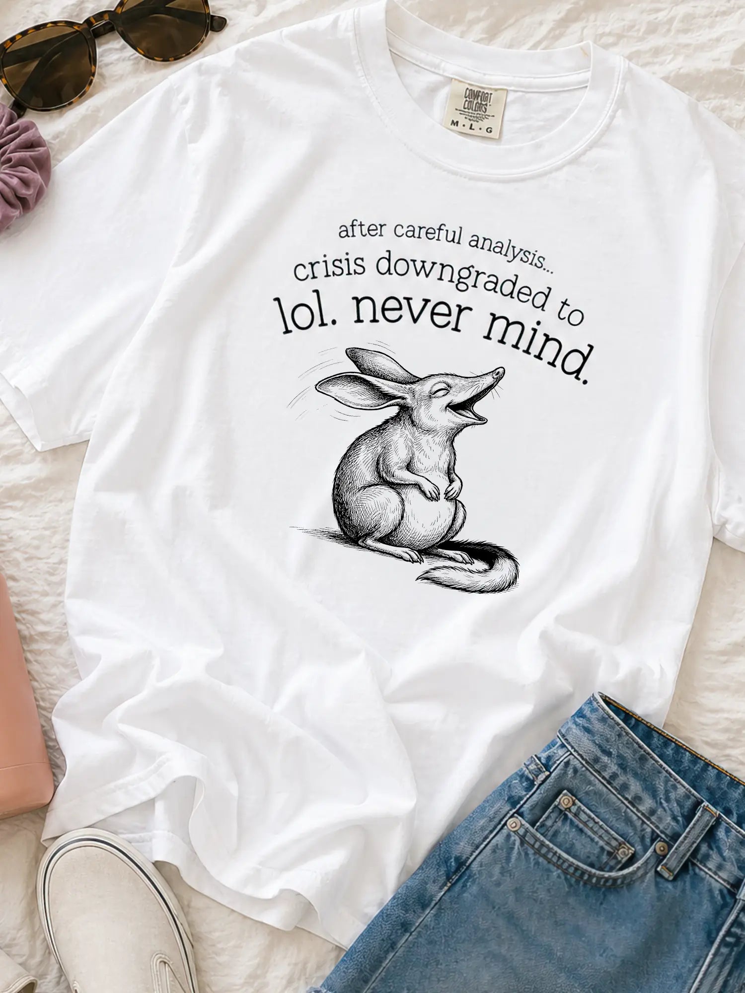 Faffle & Co Bilby Crisis Tee in white styled flat lay