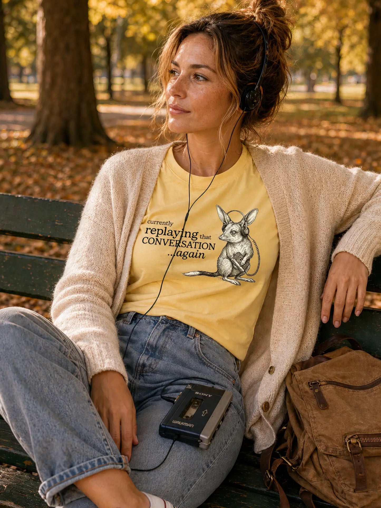 Person wearing the Faffle & Co Bilby on Replay Tee in butter