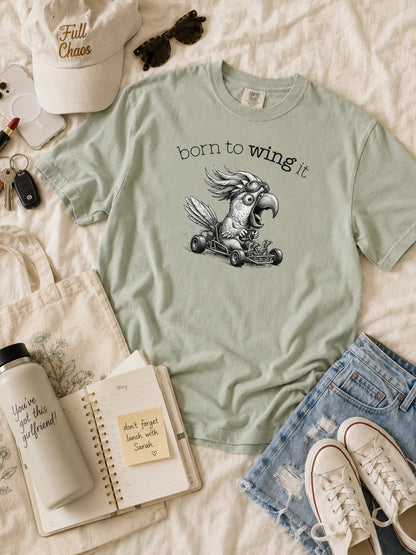 Born to Wing It cockatoo t-shirt in bay styled flat lay