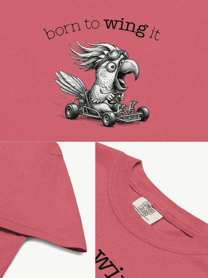Close-up details of the Born to Wing It cockatoo t-shirt in watermelon showing print texture, folded view, and collar