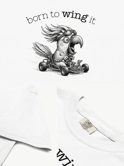 Close-up details of the Born to Wing It cockatoo t-shirt in white showing print texture, folded view, and collar