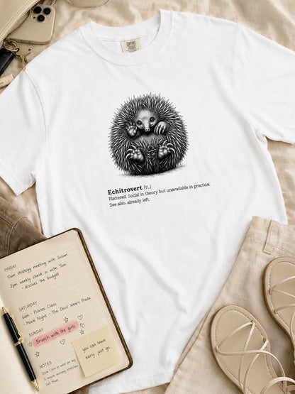 The Echitrovert t-shirt in white styled flat lay