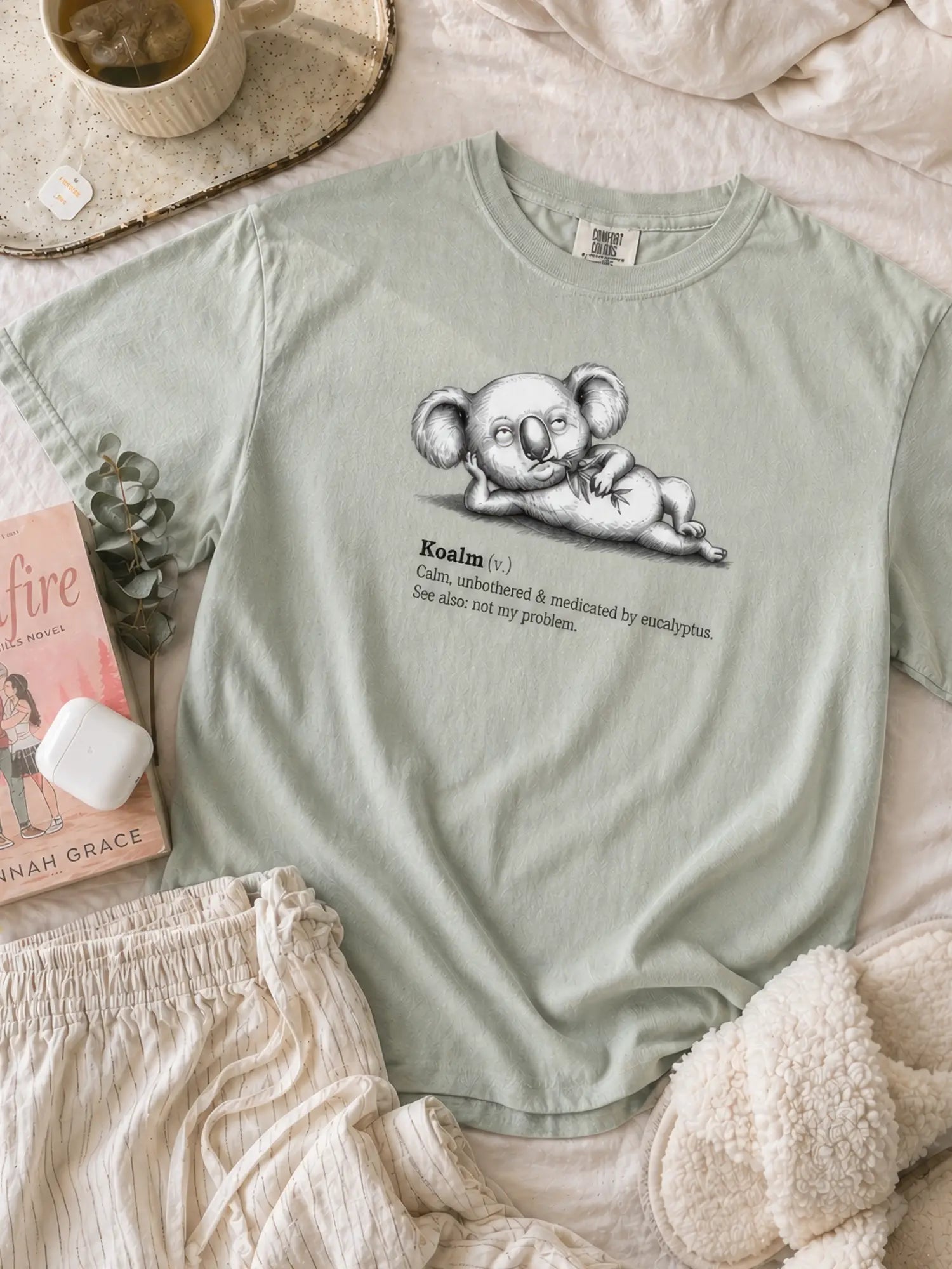 Faffle & Co Koalm Tee in bay styled flat lay