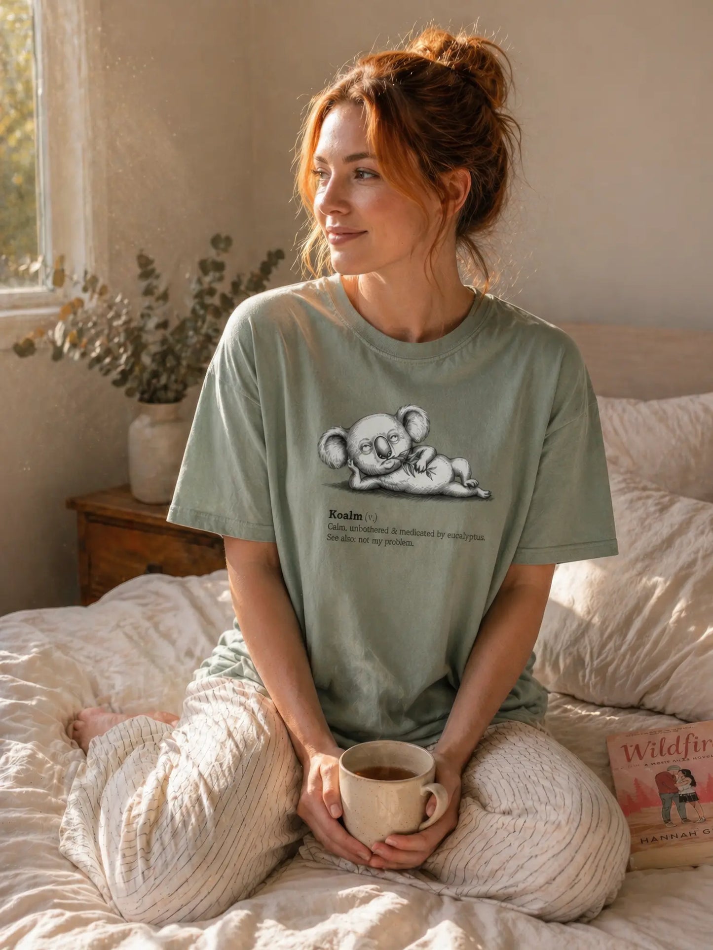 Person wearing the Faffle & Co Koalm Tee in bay