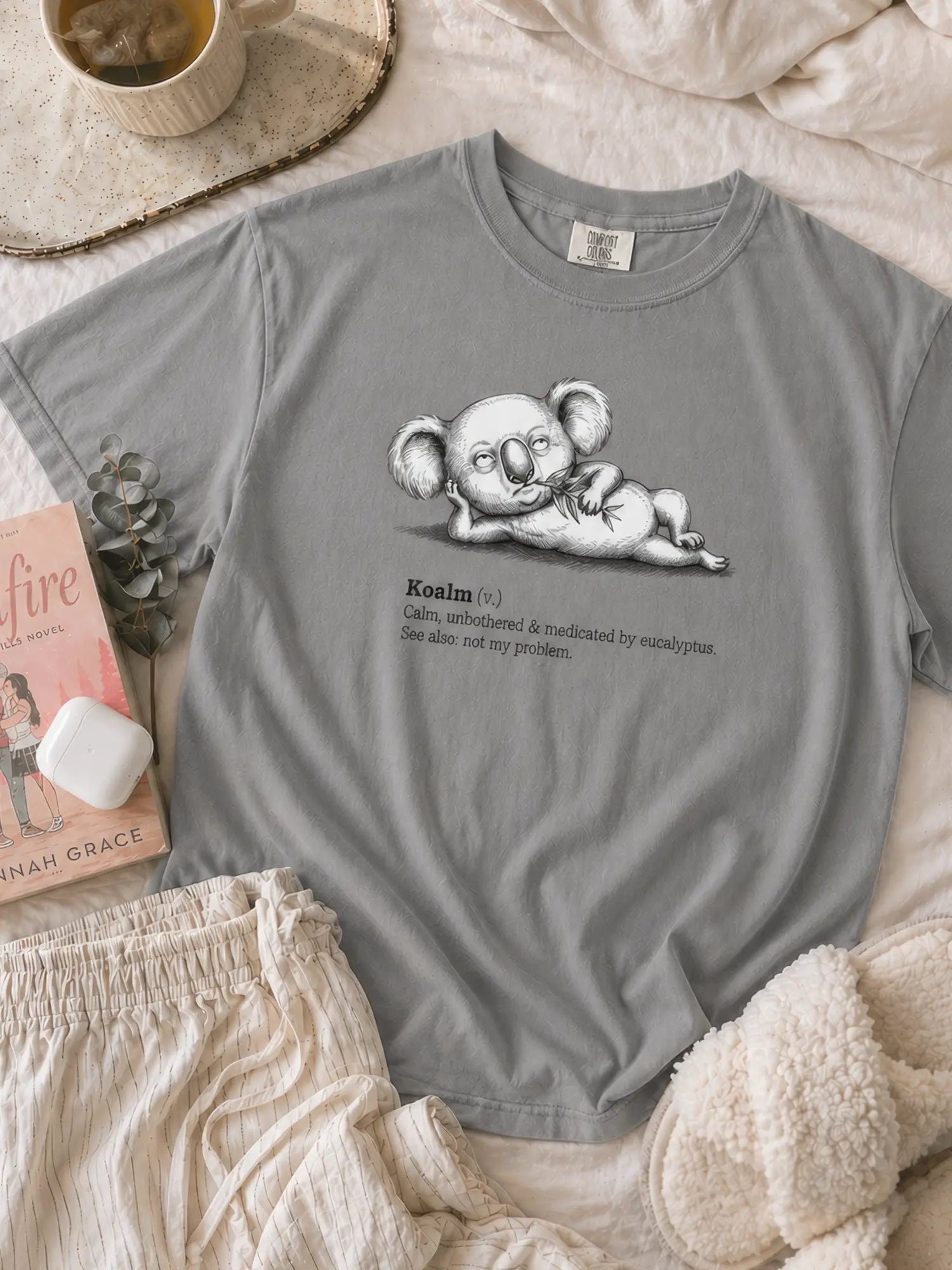 Faffle & Co Koalm Tee in grey styled flat lay