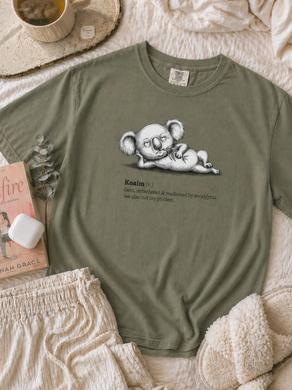 Faffle & Co Koalm Tee in moss styled flat lay