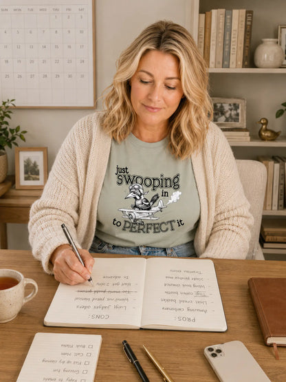 Person wearing the Just Swooping In magpie t-shirt in bay