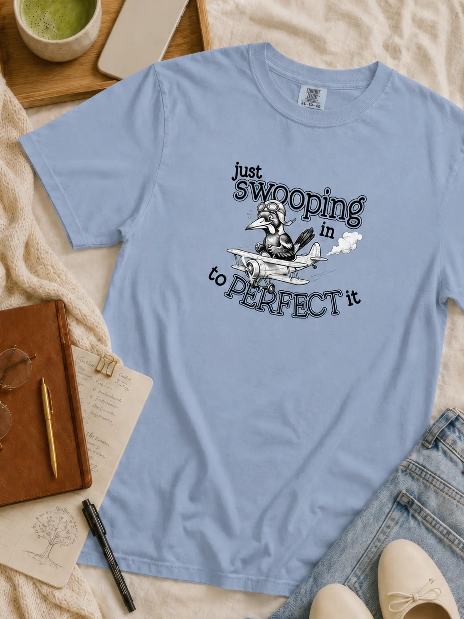 Just Swooping In magpie t-shirt in washed denim styled flat lay
