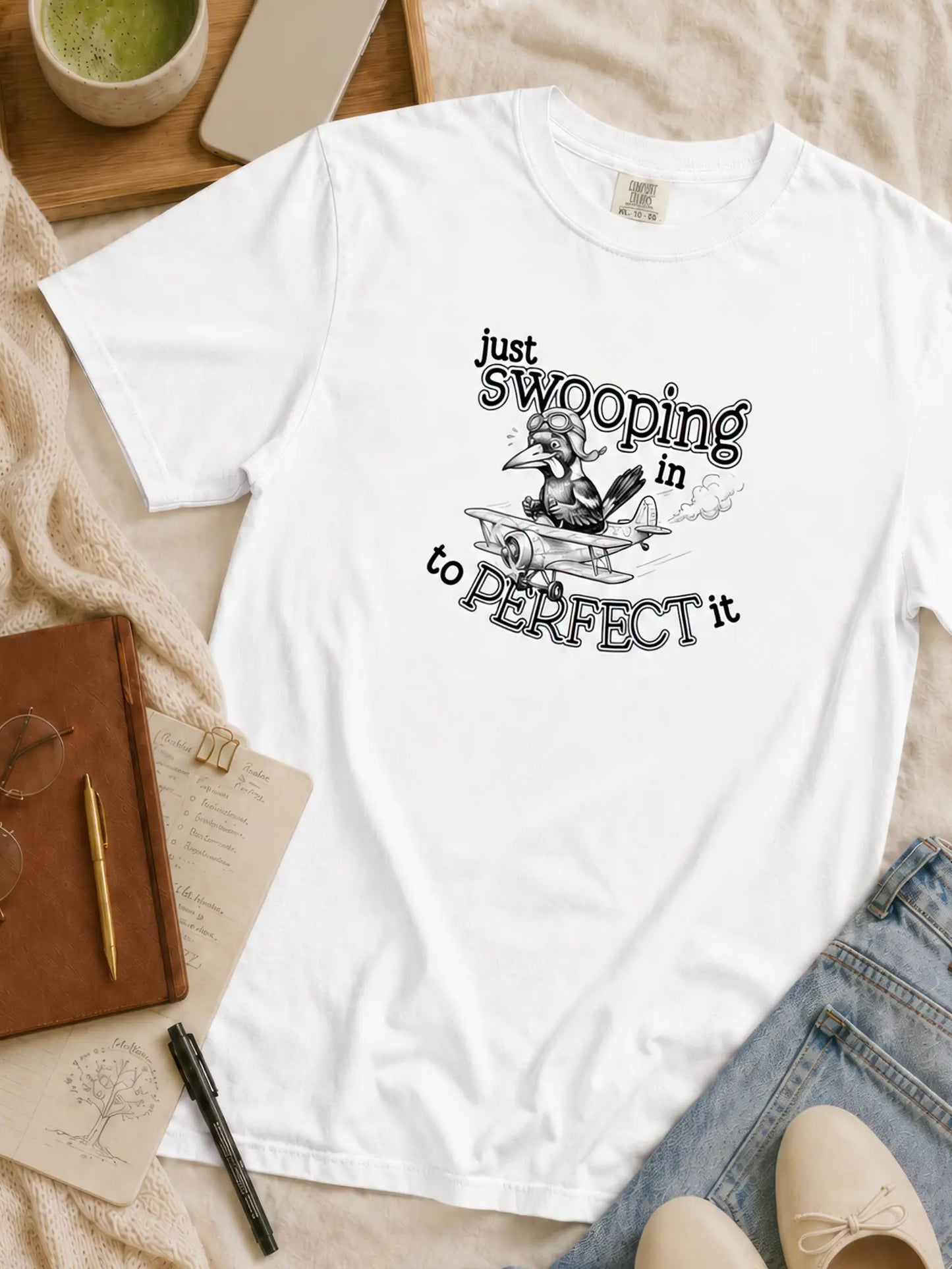 Just Swooping In magpie t-shirt in white styled flat lay