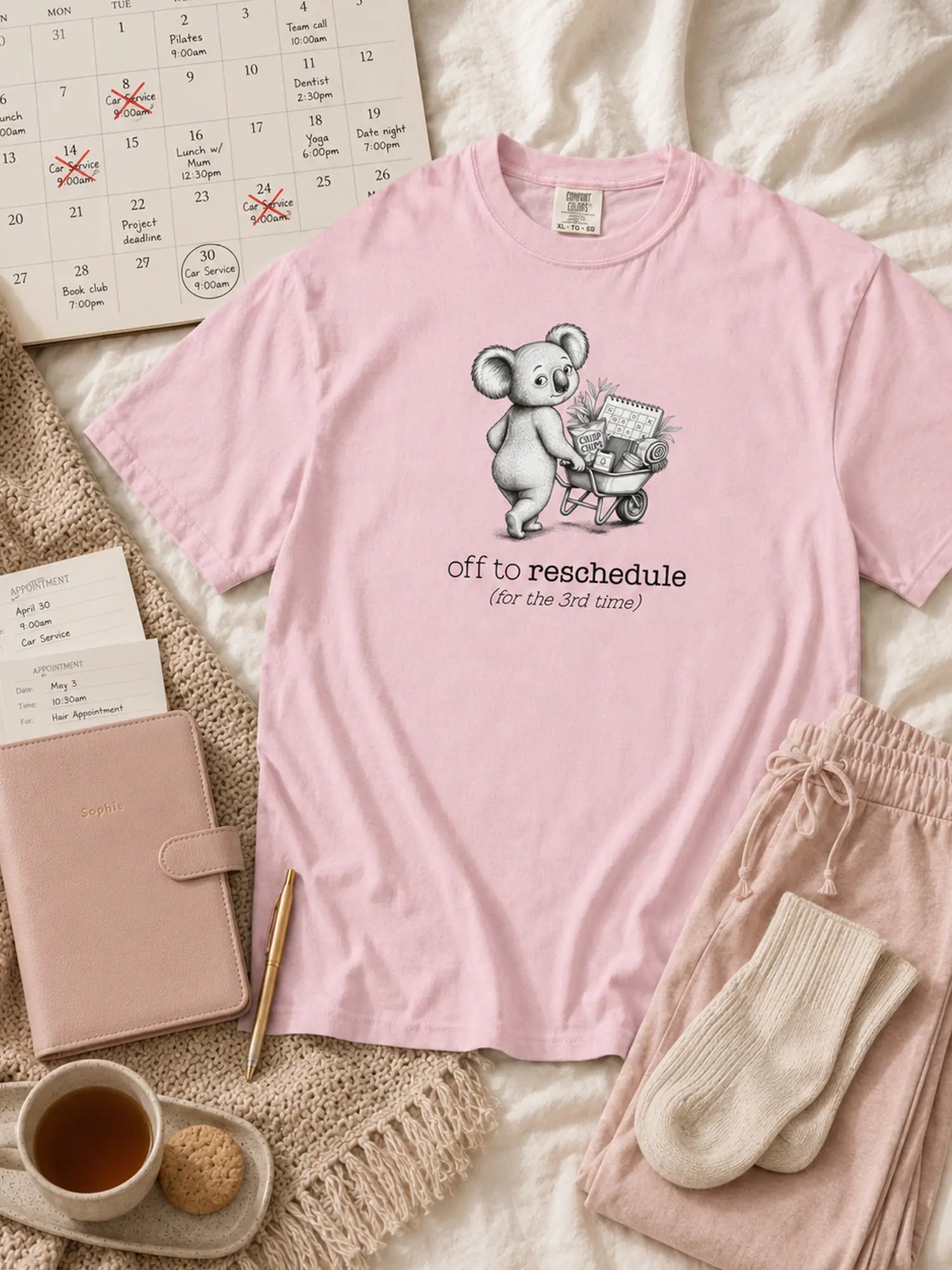 Off to Reschedule koala t-shirt in blossom styled flat lay