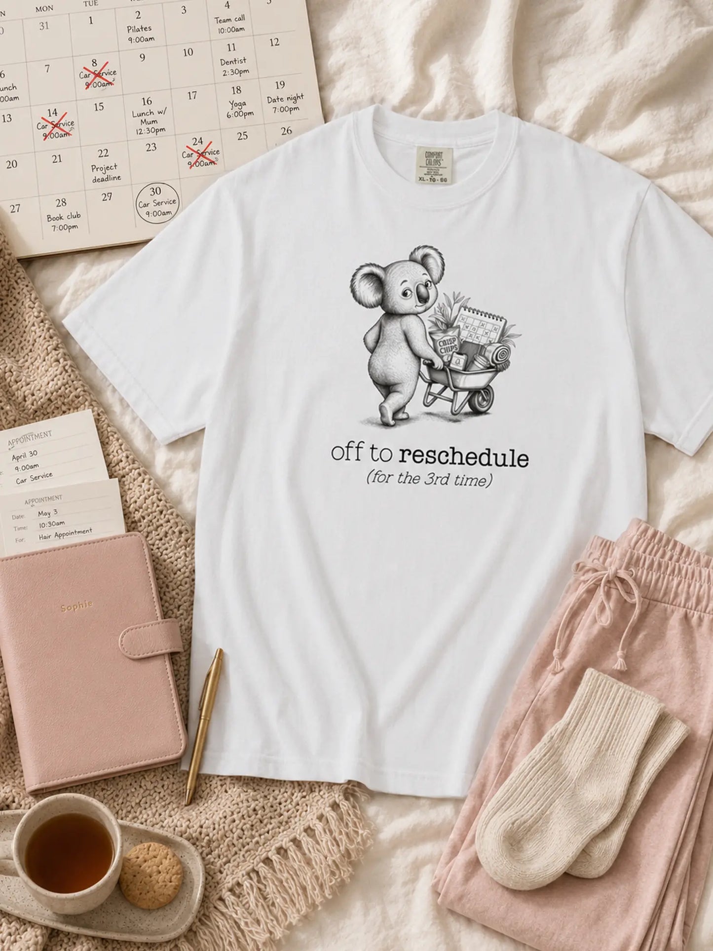 Off to Reschedule koala t-shirt in white styled flat lay