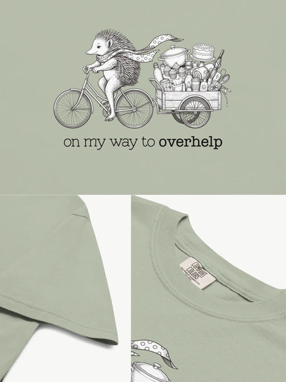 Close-up details of the Over-helping Echidna Tee in bay showing print texture, folded view, and collar