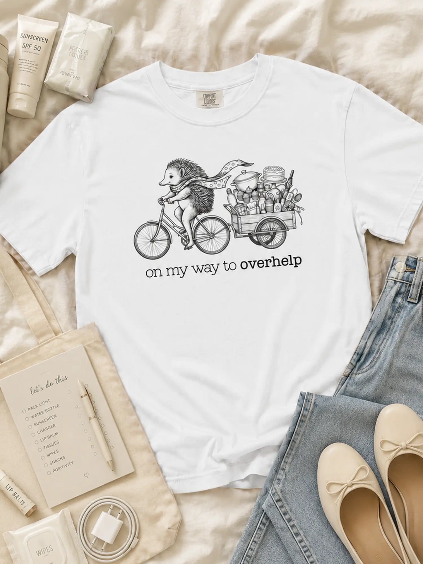Over-helping Echidna Tee in white styled flat lay