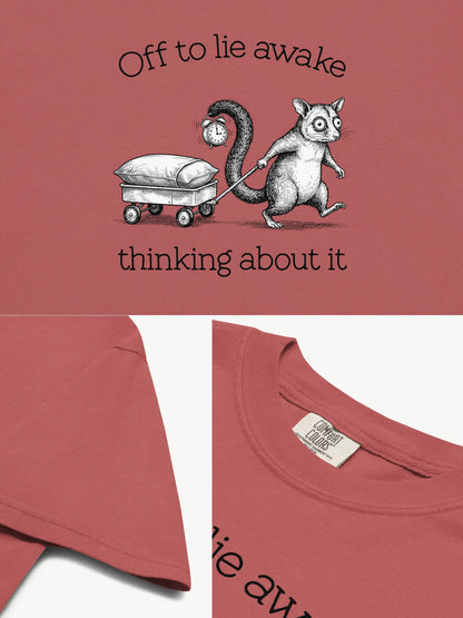 Close-up details of the Faffle & Co Sleepless Possum Tee in crimson