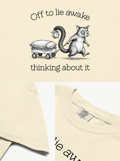 Close-up details of the Faffle & Co Sleepless Possum Tee in ivory