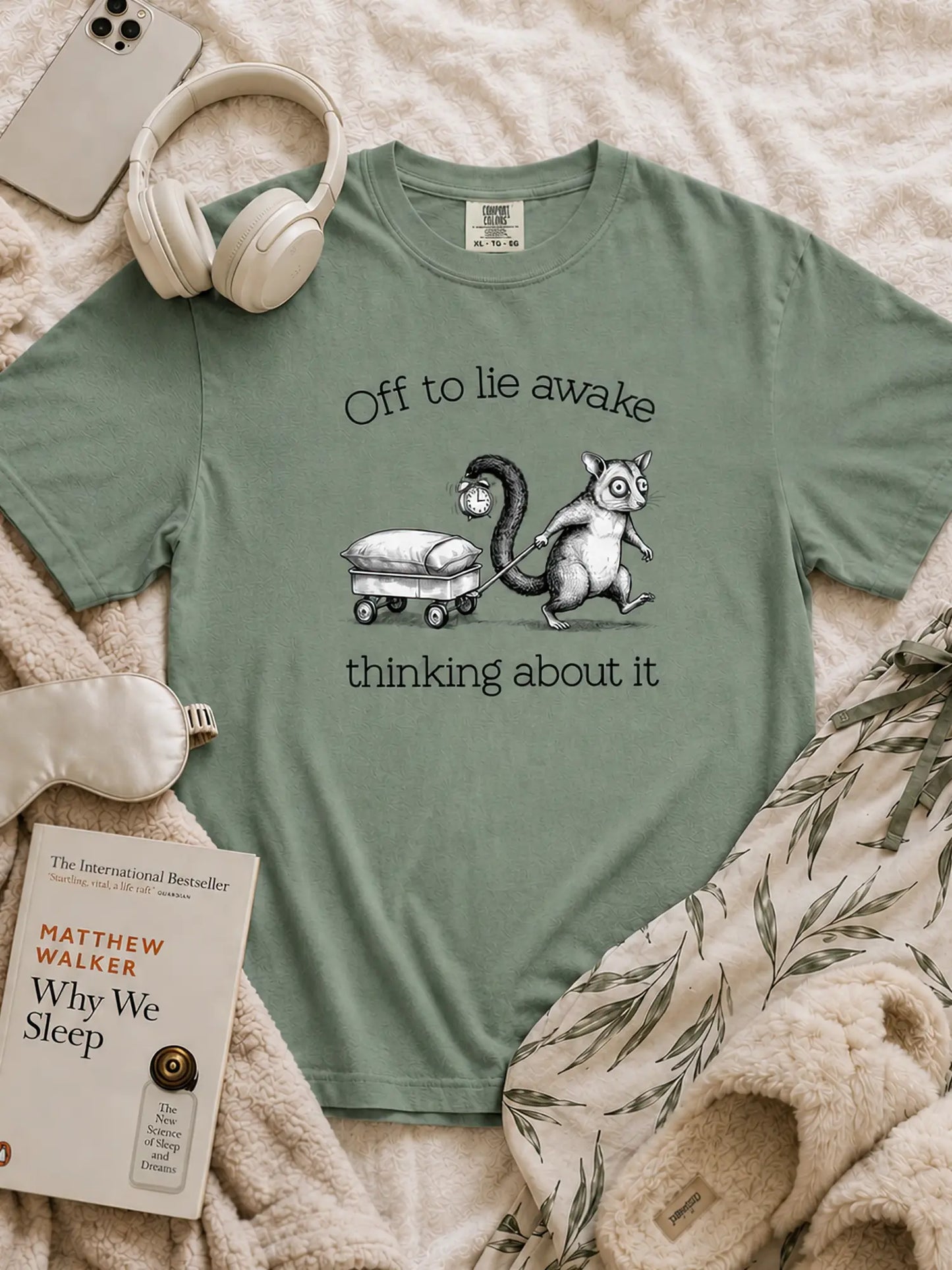 Faffle & Co Sleepless Possum Tee in light green styled flat lay