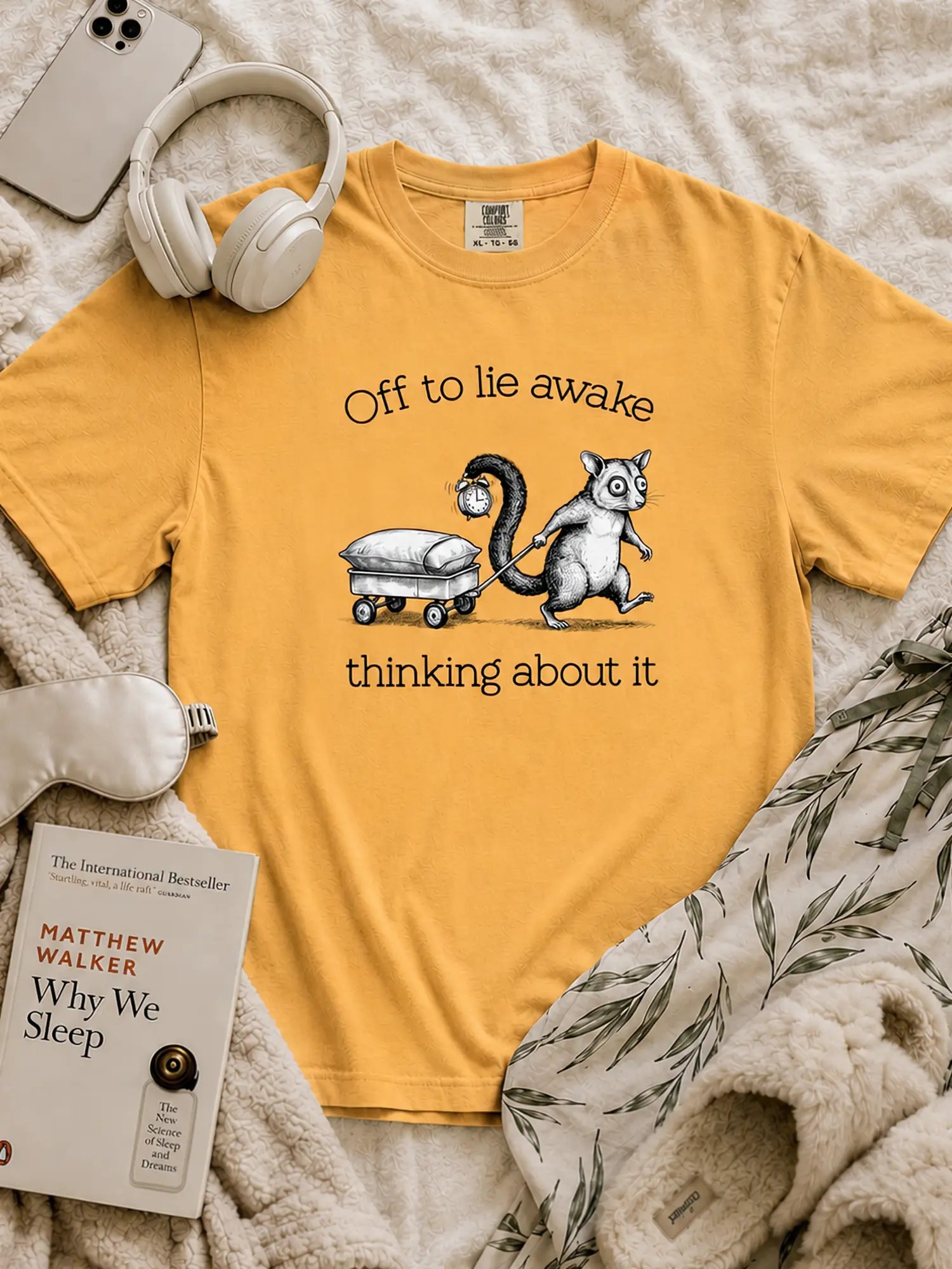 Faffle & Co Sleepless Possum Tee in mustard styled flat lay