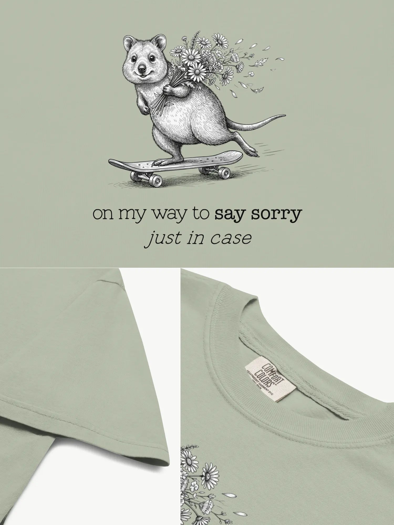 Close-up details of The Sorry Quokka t-shirt in bay showing print texture, folded view, and collar