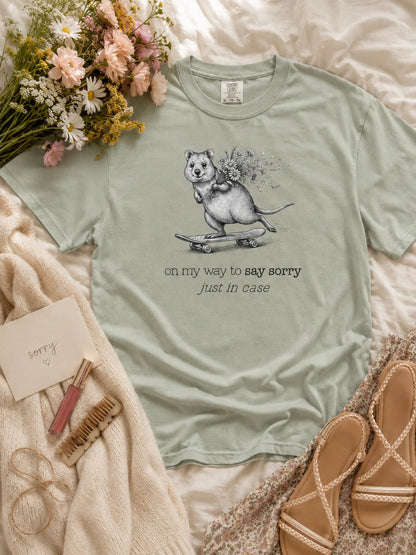 The Sorry Quokka t-shirt in bay styled flat lay