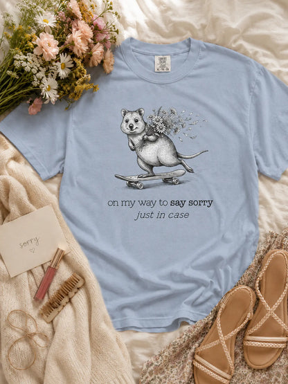 The Sorry Quokka t-shirt in washed denim styled flat lay
