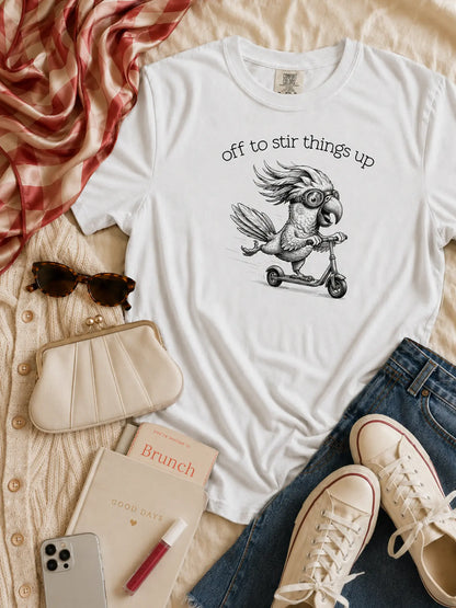 Off to Stir Things Up cockatoo t-shirt in white styled flat lay
