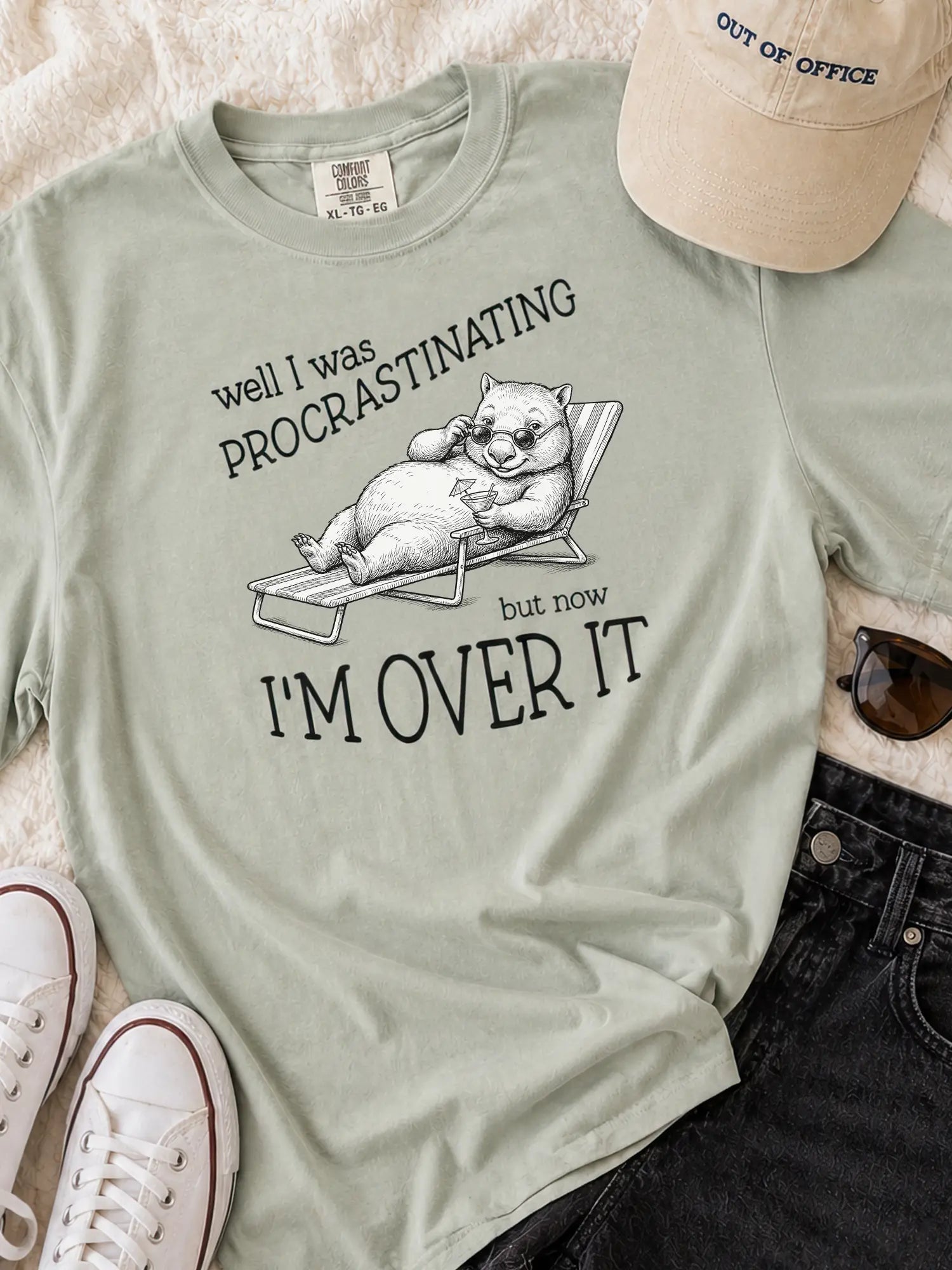 Faffle & Co Wombat Procrastinator Tee in bay styled flat lay