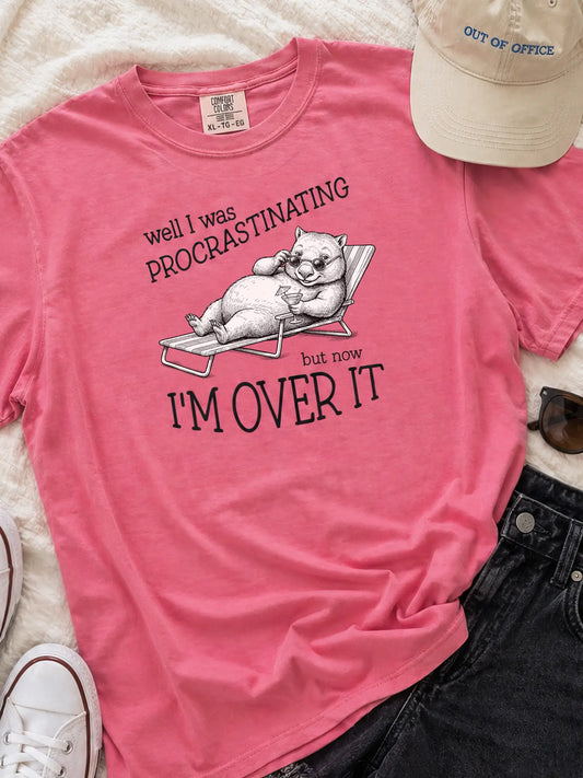 Faffle & Co Wombat Procrastinator Tee in crunchberry styled flat lay
