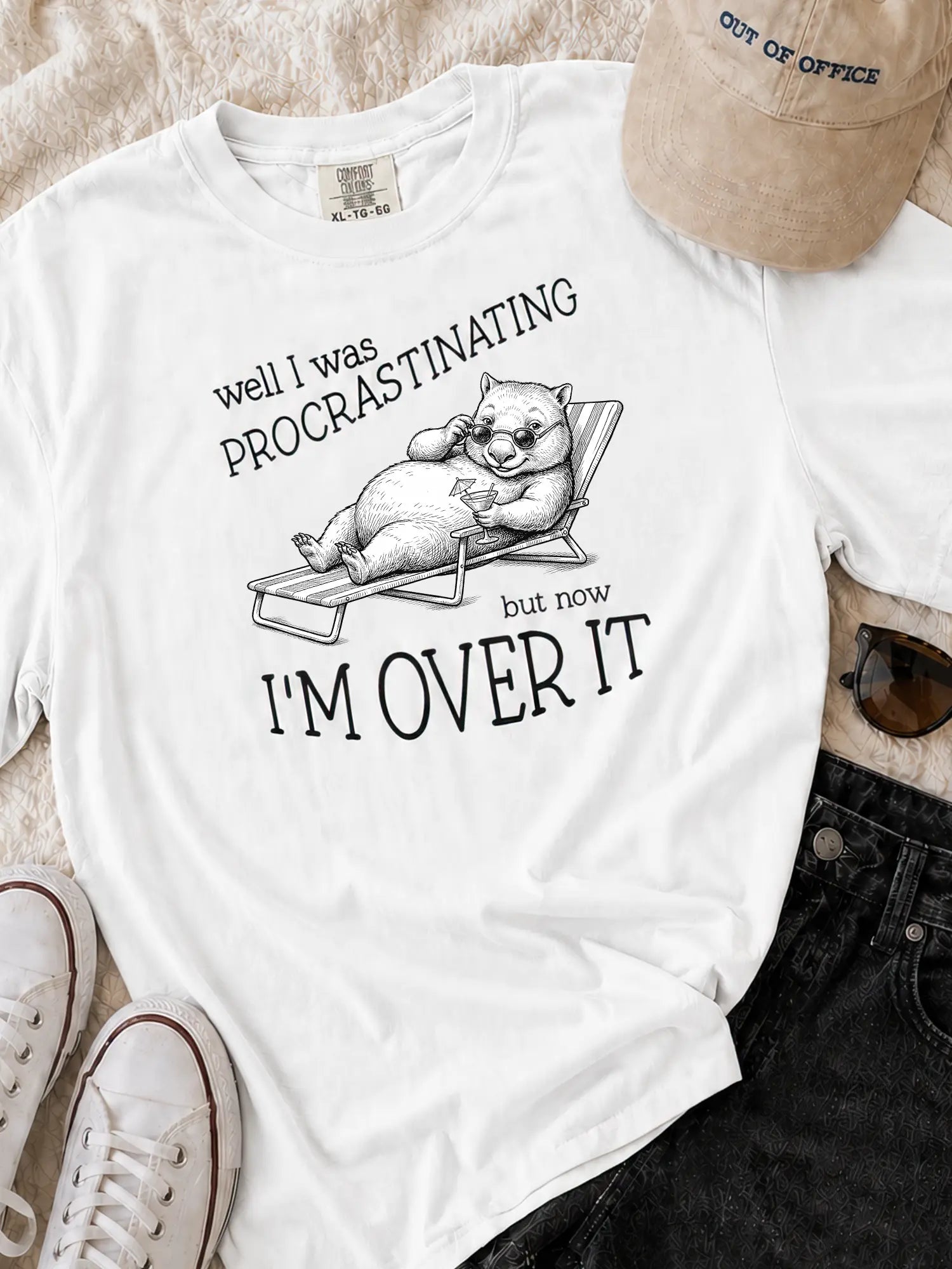 Faffle & Co Wombat Procrastinator Tee in white styled flat lay
